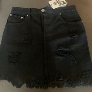 The rockn rev black jean skirt